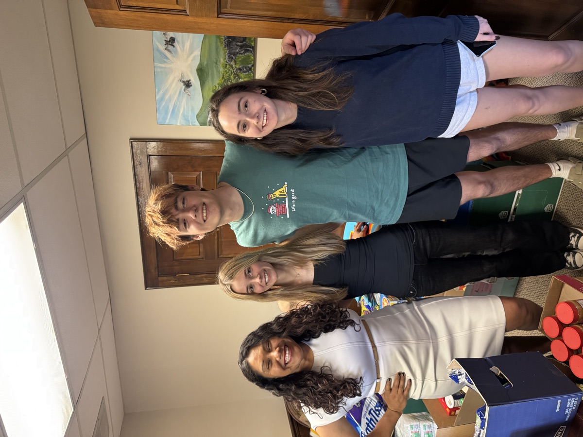 Sandra Aguirre and volunteers packing Hope Pantry supplies